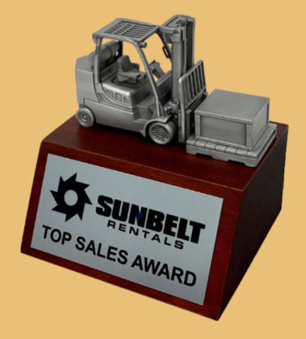 Forklift truck operator award trophy for achievement recognition with custom corporate logo on a plaque