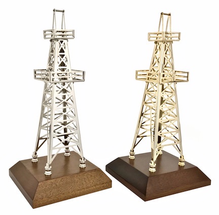 Gold oil derrick model for oilfield and gas well drilling trophy.